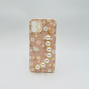 Casing ponsel HHPK21 warna pink dengan motif bunga dan tali. 